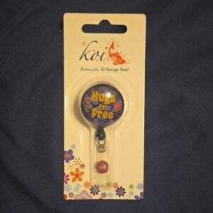 Koi 'Hugs for Free' ID Badge Reel - Blue